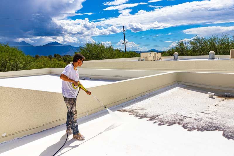 Cleaning A Roof Before Roof Coating